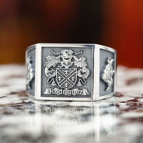 CLAN CREST RINGS .